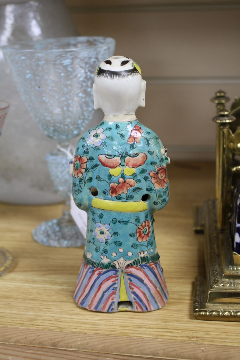 A near pair of Chinese polychrome-decorated figural incense burners and another similar incense burner, Jiaqing period (1796-1820)
